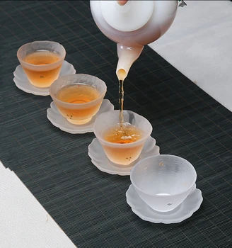 Stiklo teacup karščiui atsparaus stiklo arbatos puodelio ir bazės lėkštė